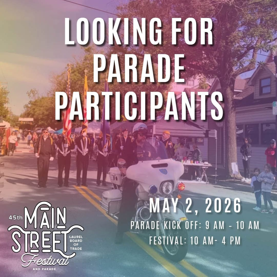 Auto-generated description: A colorful parade with participants marching down the street is announced for May 2, 2026, at the 45th Main Street Festival.